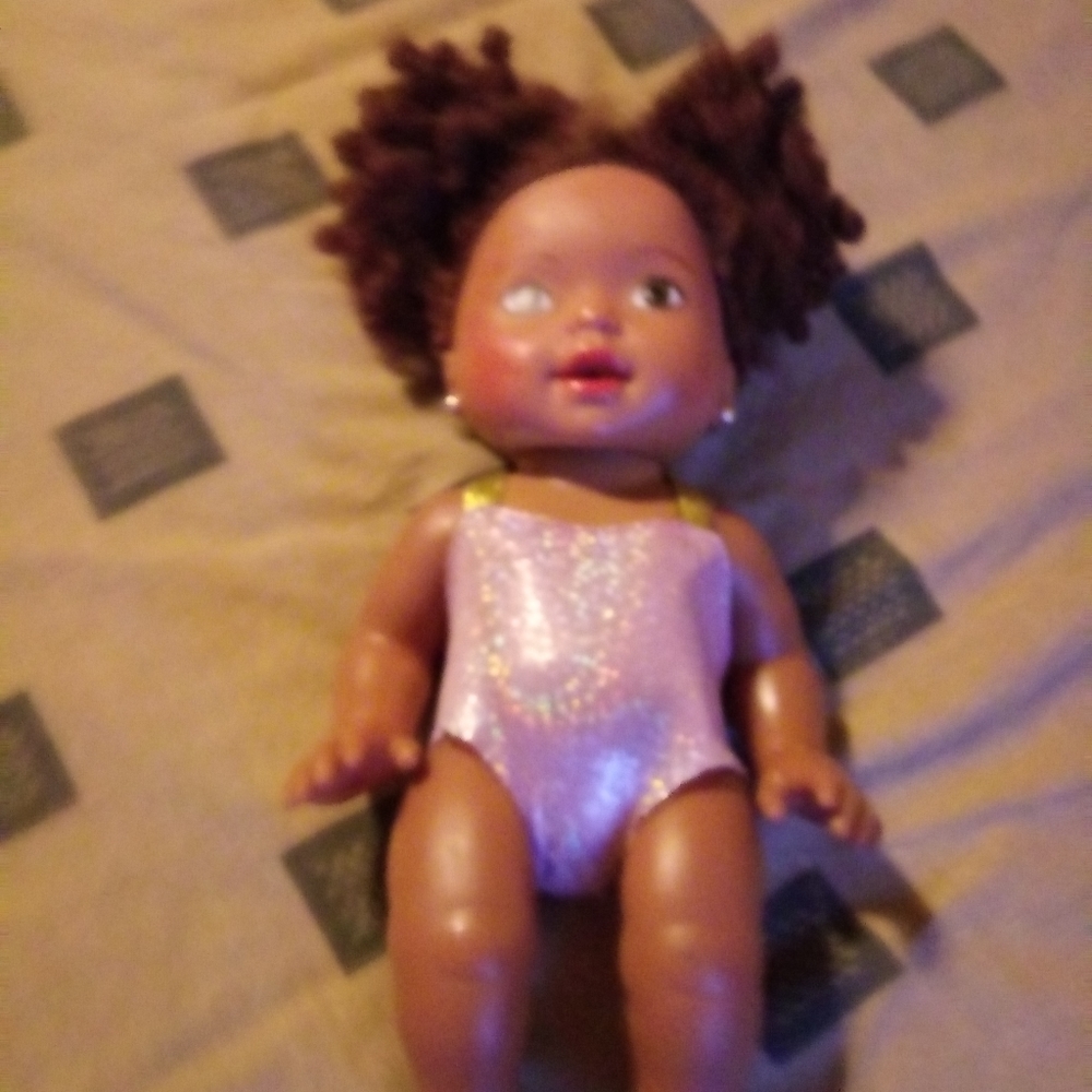 Doll in pink outfit